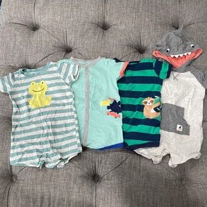 Baby Boy’s Set Of 4 Carter’s Button Rompers Sizes ranging 6-12 Months